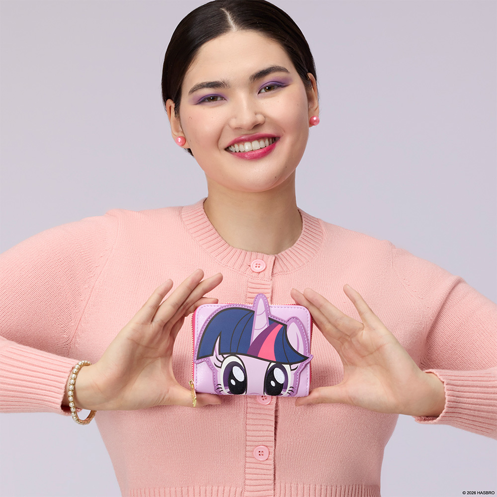 Gray background with model showcasing Loungefly My Little Pony wallet