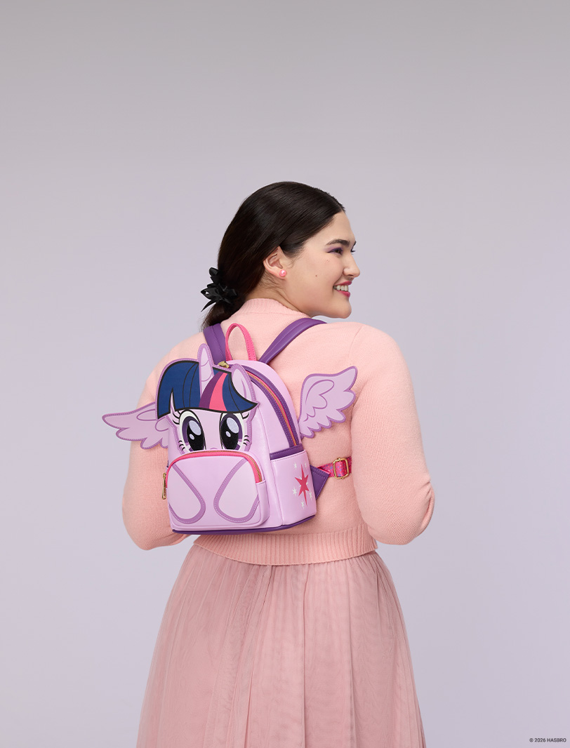 Gray background with model showcasing Loungefly My Little Pony mini backpack